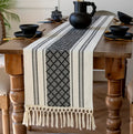 Woven textured table runner with tassels