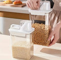 Storage containers with measuring cup