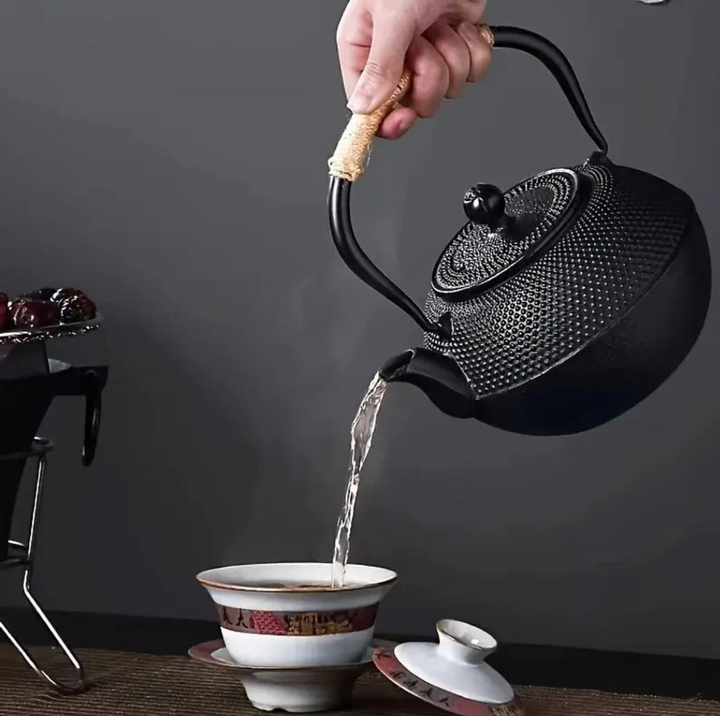 Original heavy duty cast iron tea pot with infuser, cast iron coaster and spoon