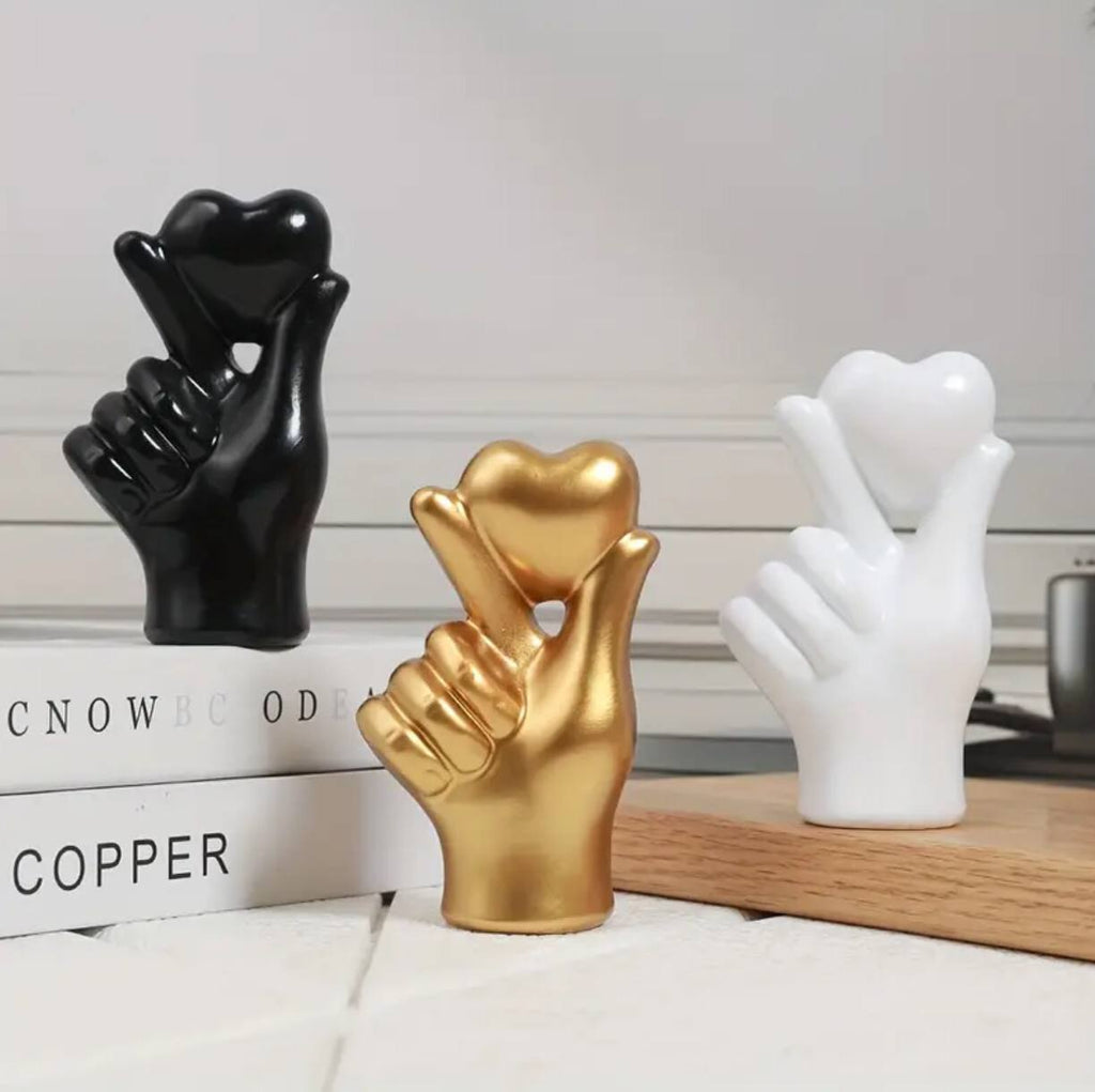 Heart hand gesture decor statue