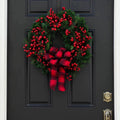 Christmas Red wreath front door hanging with decorations