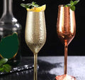 A pair of Gold Stainless steel wine glass
