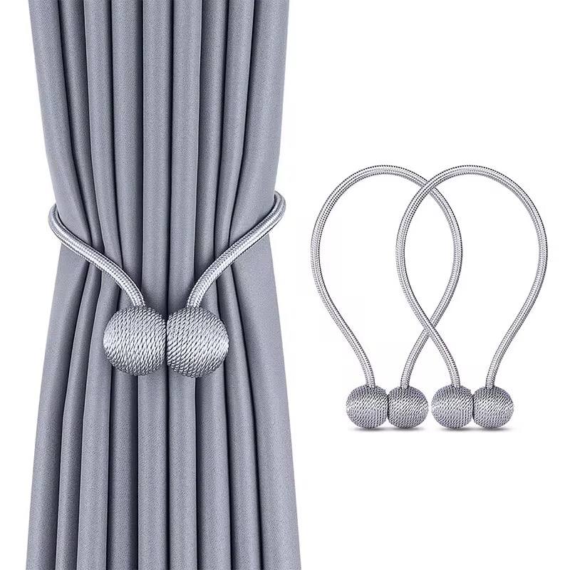 Magnetic tieback curtain holder