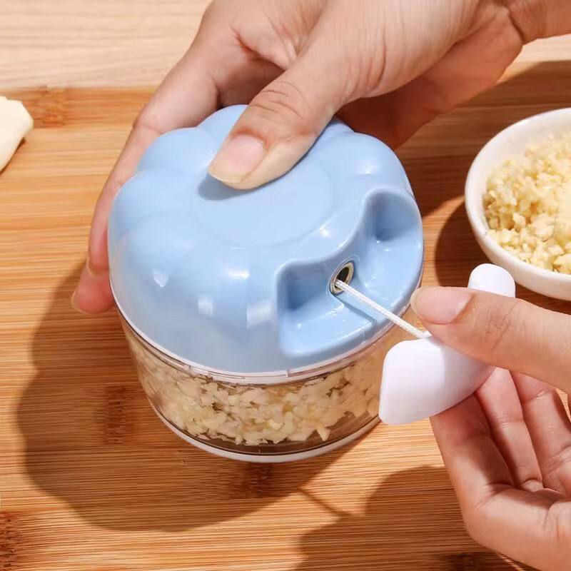 Garlic pull grinder