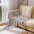 Knitted throw blanket