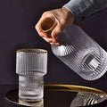 Custom Vertical Decanter with Bamboo lid & 6pcs Highball Glassware with Gold Rim.