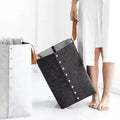 Foldable laundry basket with leather handles